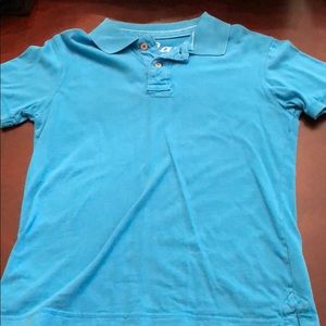 Blue polo by red camel